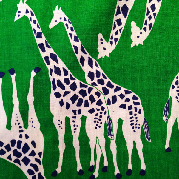Print of giraffes on a summer skirt